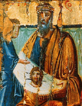 10th-century fresco painting of a man wearing a beaded headress.